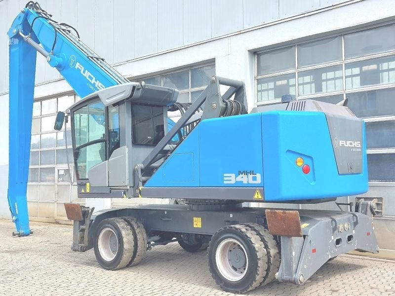 Fuchs MHL 340 F - Hulladék kotró: 3 kép. Fuchs MHL 340 F - Hulladék kotró: 3 kép.