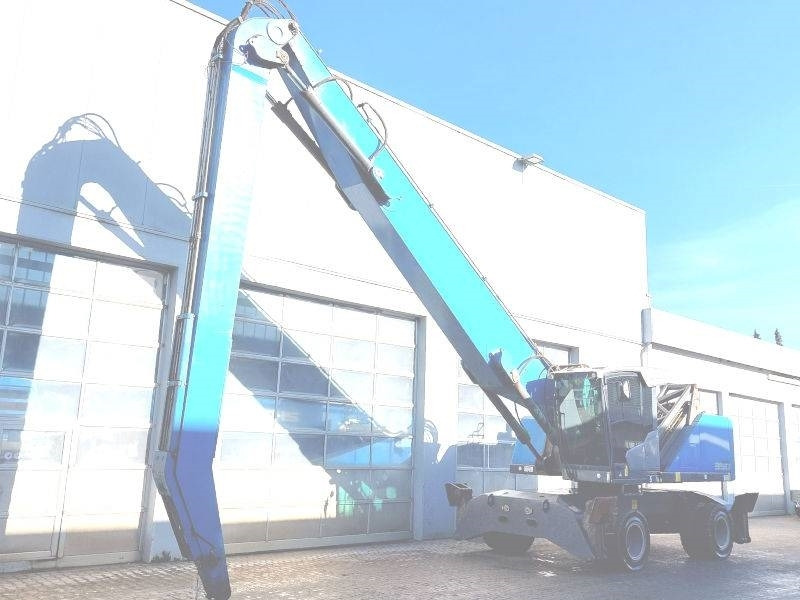 Fuchs MHL 350 F - Hulladék kotró: 2 kép. Fuchs MHL 350 F - Hulladék kotró: 2 kép.