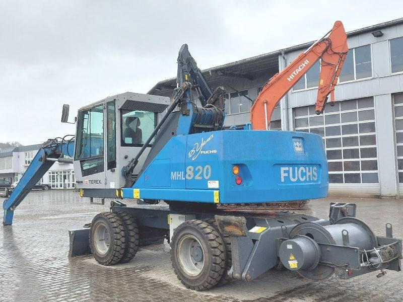 Fuchs MHL 820 D Elektro - Hulladék kotró: 3 kép. Fuchs MHL 820 D Elektro - Hulladék kotró: 3 kép.