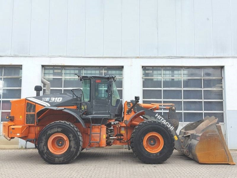 Hitachi ZW 310-7 - Gumikerekes homlokrakodó: 5 kép. Hitachi ZW 310-7 - Gumikerekes homlokrakodó: 5 kép.