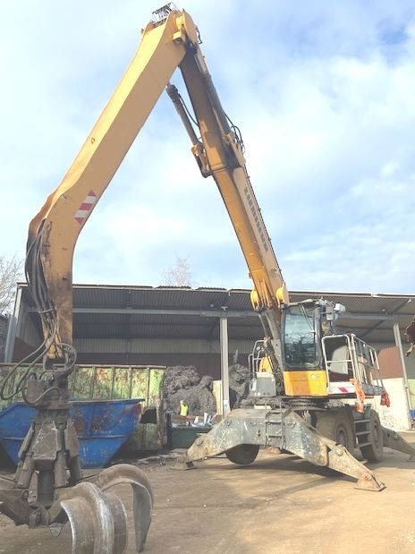 Liebherr LH 50 - Hulladék kotró: 3 kép. Liebherr LH 50 - Hulladék kotró: 3 kép.