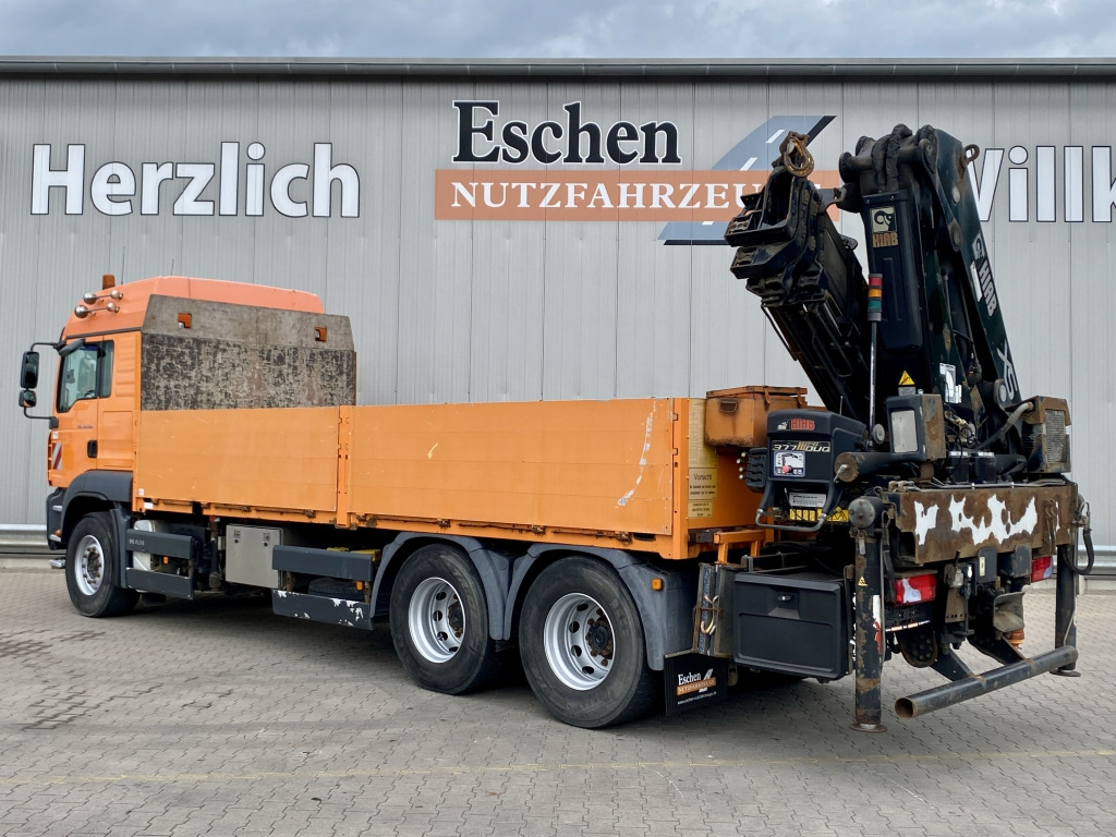 MAN TGA 26.480 6x4 BL / HIAB 377 EP-4 Faltkran - Platós teherautó, Darus autó: 3 kép. MAN TGA 26.480 6x4 BL / HIAB 377 EP-4 Faltkran - Platós teherautó, Darus autó: 3 kép.