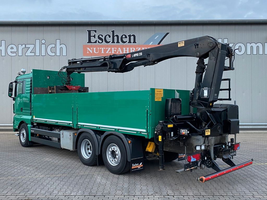 MAN TGX 26.460 | HIAB*Funk*Lenk-Lift*AHK*Navi*Klima - Platós teherautó, Darus autó: 3 kép. MAN TGX 26.460 | HIAB*Funk*Lenk-Lift*AHK*Navi*Klima - Platós teherautó, Darus autó: 3 kép.