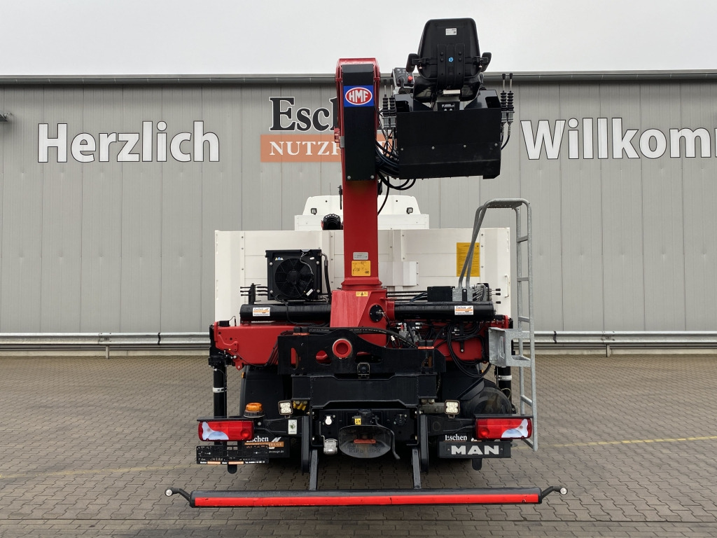 MAN TGX 26.500 6x2-4 LL / HMF 2110 L-MC Kran - Platós teherautó, Darus autó: 4 kép. MAN TGX 26.500 6x2-4 LL / HMF 2110 L-MC Kran - Platós teherautó, Darus autó: 4 kép.