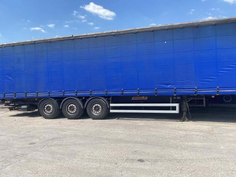 Fruehauf - Ponyvás félpótkocsi: 5 kép. Fruehauf - Ponyvás félpótkocsi: 5 kép.