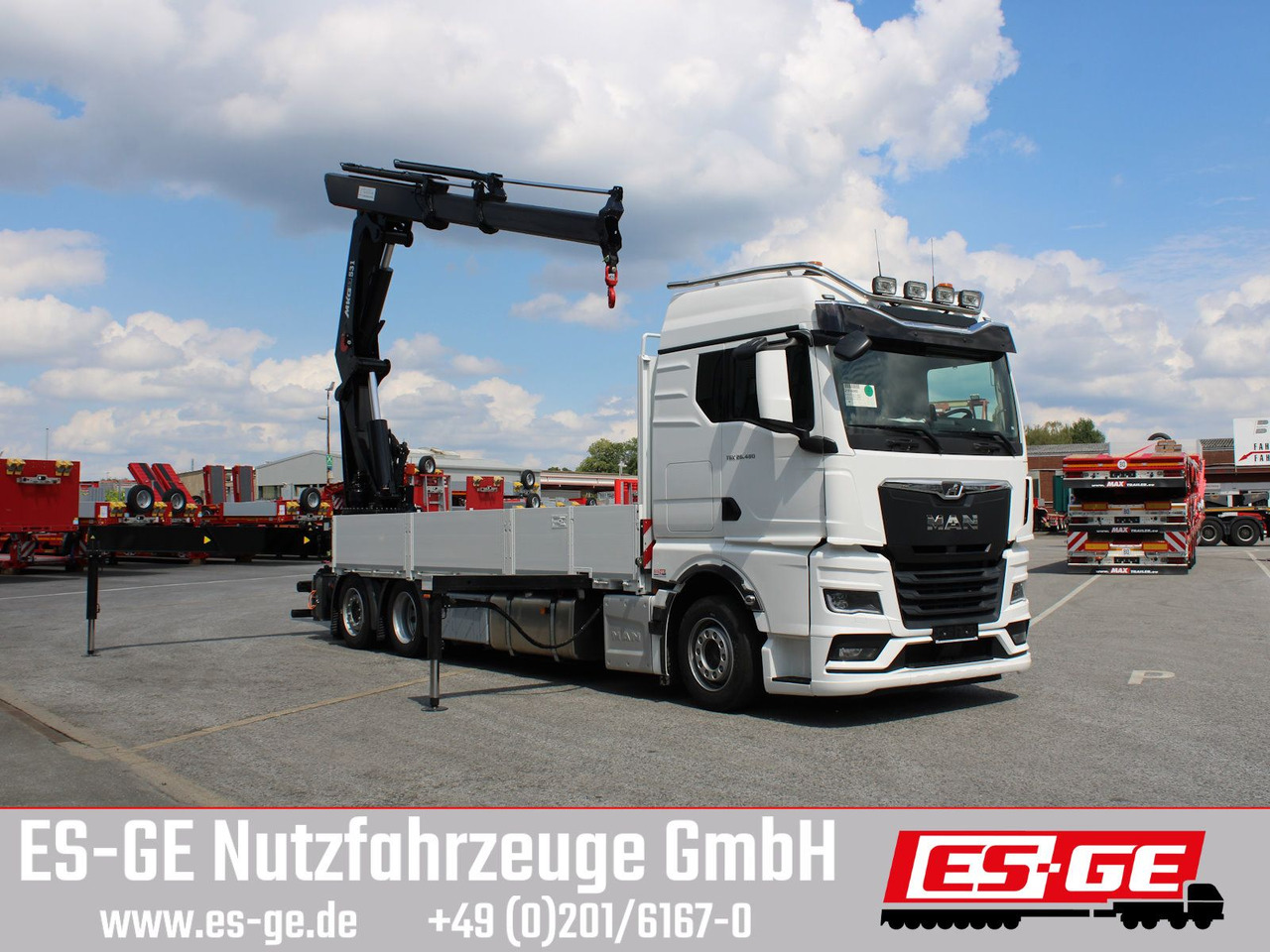 MAN TGX 26.480 6x2-4 LL CH mit MKG HLK531 a5 - Platós teherautó, Darus autó: 3 kép. MAN TGX 26.480 6x2-4 LL CH mit MKG HLK531 a5 - Platós teherautó, Darus autó: 3 kép.