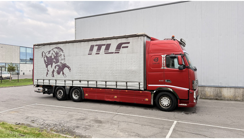 Volvo FH13 540 - Ponyvás teherautó: 5 kép. Volvo FH13 540 - Ponyvás teherautó: 5 kép.