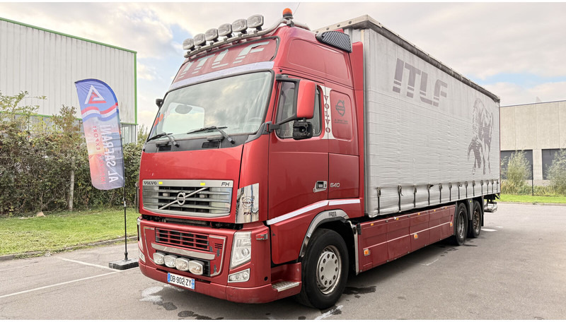 Volvo FH13 540 - Ponyvás teherautó: 1 kép. Volvo FH13 540 - Ponyvás teherautó: 1 kép.