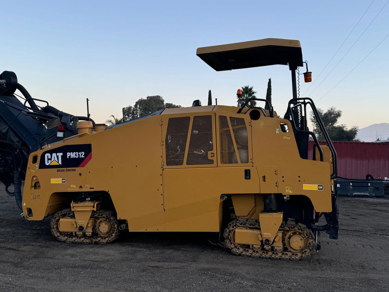 Caterpillar PM312 - Aszfaltmaró: 1 kép. Caterpillar PM312 - Aszfaltmaró: 1 kép.