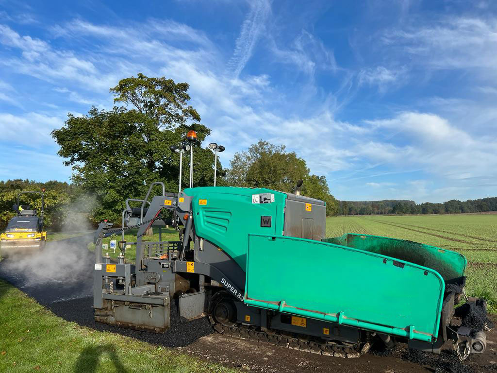 Vogele Super 800i - Útburkológép: 4 kép. Vogele Super 800i - Útburkológép: 4 kép.