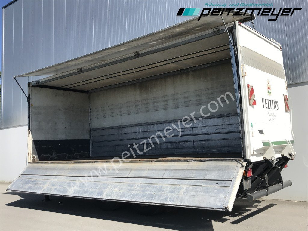 ACKERMANN,O. Getränkeanhänger Ewers Getränke Schwenkwand (LBW def.) Tandem tiefgekuppelt - Pótkocsi italszállító: 2 kép. ACKERMANN,O. Getränkeanhänger Ewers Getränke Schwenkwand (LBW def.) Tandem tiefgekuppelt - Pótkocsi italszállító: 2 kép.