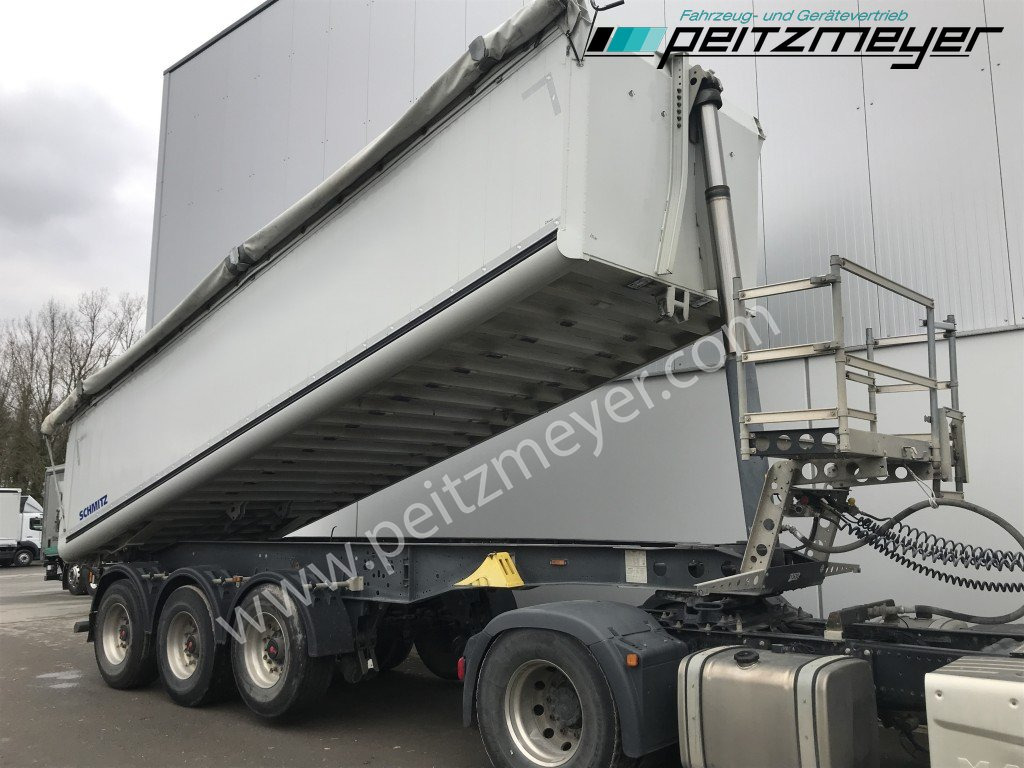 SCHMITZ 3 Achs Kippauflieger SKI24SL7.2 Verschleißboden 5mm neu Alu - Stahl, ca. 26 m³, Getreideschieber - Félpótkocsi billenőplatós: 3 kép. SCHMITZ 3 Achs Kippauflieger SKI24SL7.2 Verschleißboden 5mm neu Alu - Stahl, ca. 26 m³, Getreideschieber - Félpótkocsi billenőplatós: 3 kép.