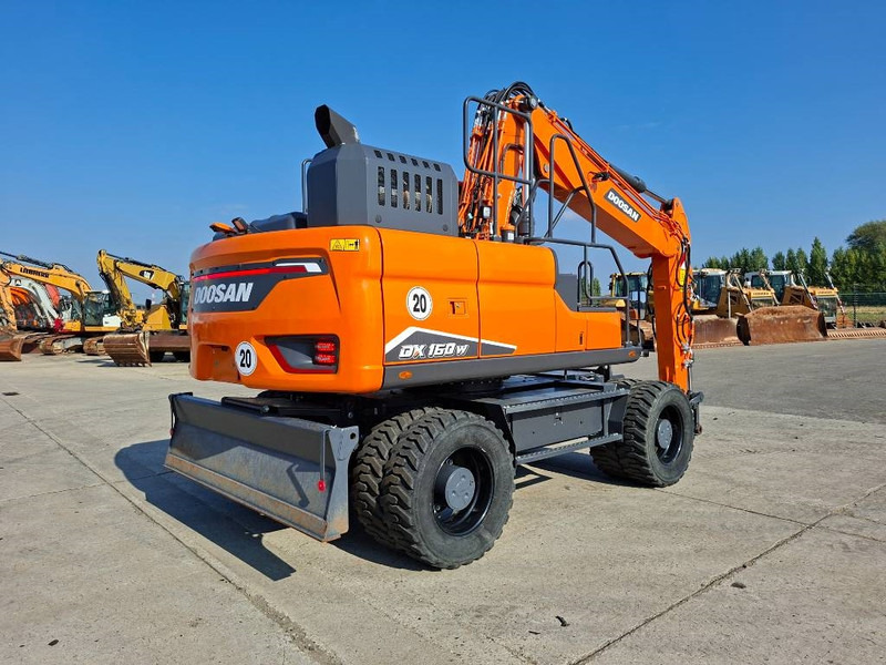Doosan DX 160 W-7 (EX Demo) - Gumikerekes kotró: 4 kép. Doosan DX 160 W-7 (EX Demo) - Gumikerekes kotró: 4 kép.