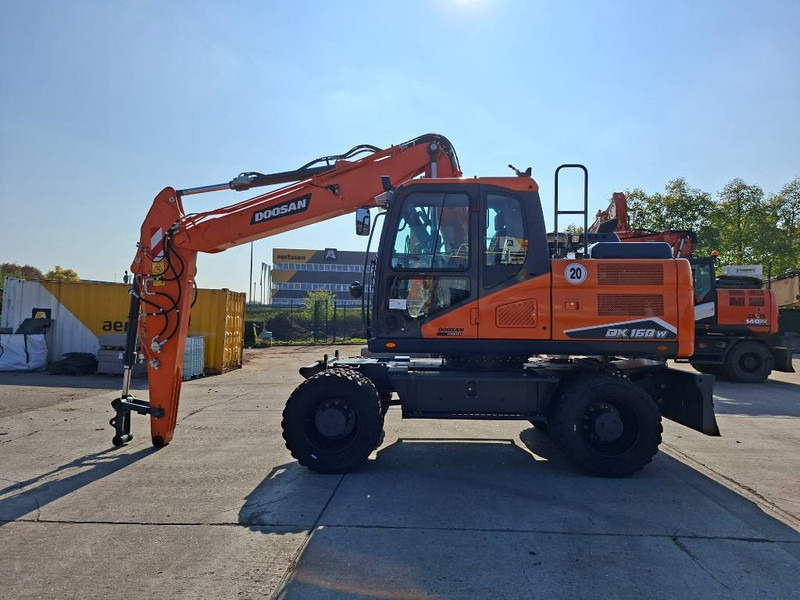 Doosan DX160W-7 - Gumikerekes kotró: 1 kép. Doosan DX160W-7 - Gumikerekes kotró: 1 kép.