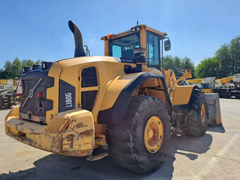 Volvo L180G - Gumikerekes homlokrakodó: 4 kép. Volvo L180G - Gumikerekes homlokrakodó: 4 kép.