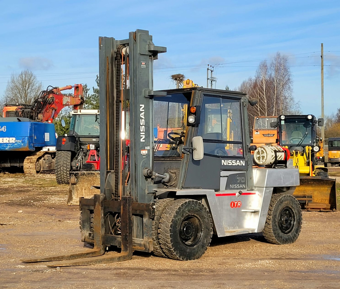 NISSAN 70 / JF05H70PU, 7 ton - Gázüzemű targonca: 1 kép. NISSAN 70 / JF05H70PU, 7 ton - Gázüzemű targonca: 1 kép.