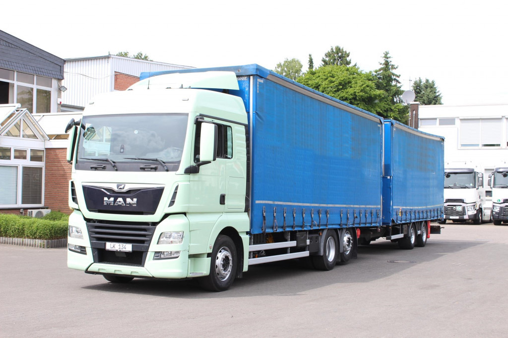 MAN TGX 26.460 Jumbo Retarder Hubdach Durchlade - Ponyvás teherautó: 1 kép. MAN TGX 26.460 Jumbo Retarder Hubdach Durchlade - Ponyvás teherautó: 1 kép.