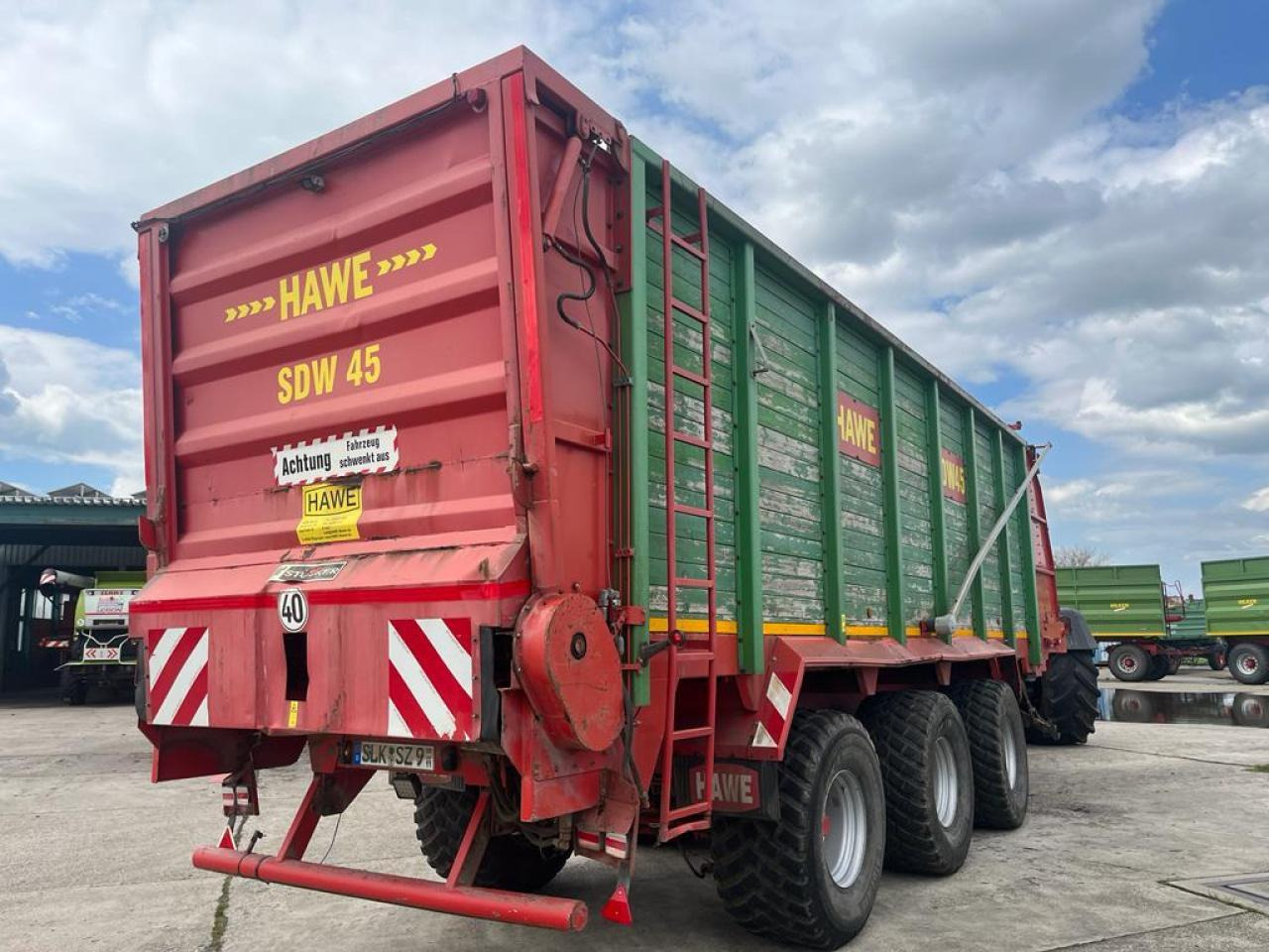 HAWE Tridem SDW 45T mit Heckentleerung - Mezőgazdasági billenőpótkocsi: 3 kép. HAWE Tridem SDW 45T mit Heckentleerung - Mezőgazdasági billenőpótkocsi: 3 kép.