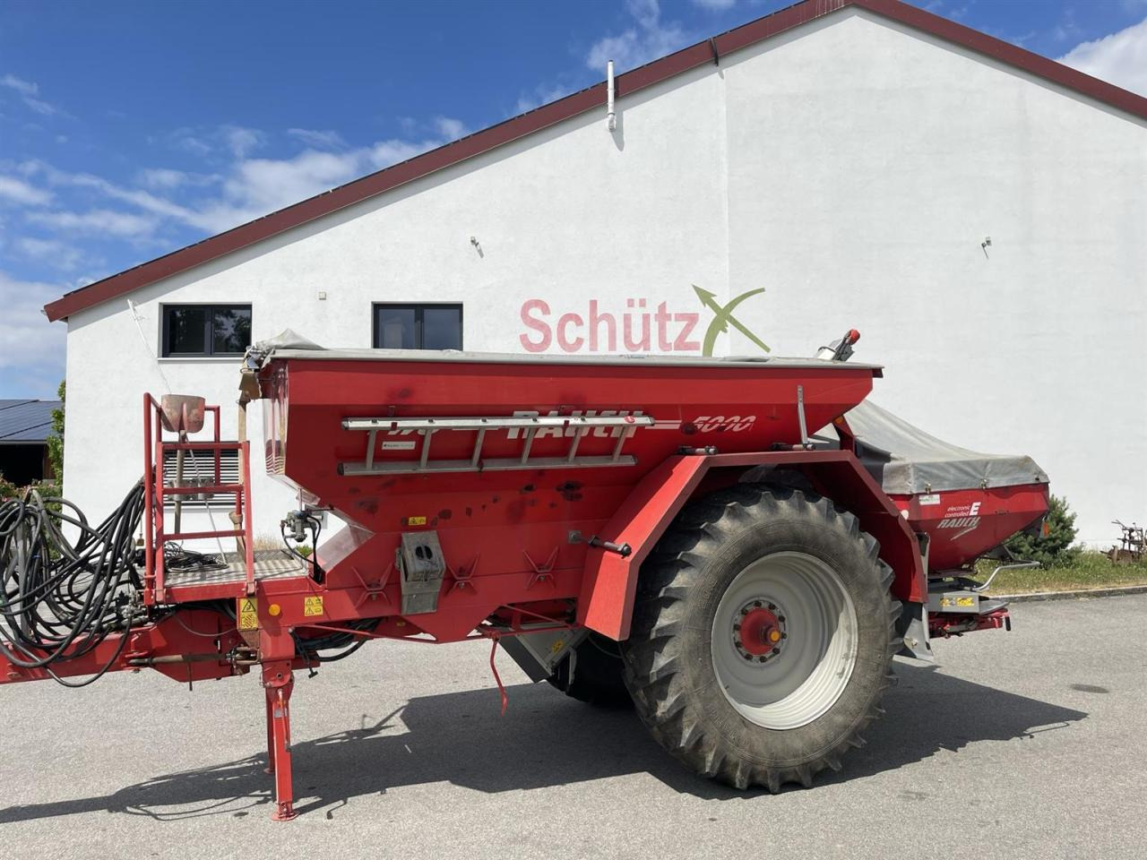 Rauch TWS 5000 Düngerwagen, Lenkung + Streuer Axera H-EMC - Műtrágyaszóró: 2 kép. Rauch TWS 5000 Düngerwagen, Lenkung + Streuer Axera H-EMC - Műtrágyaszóró: 2 kép.