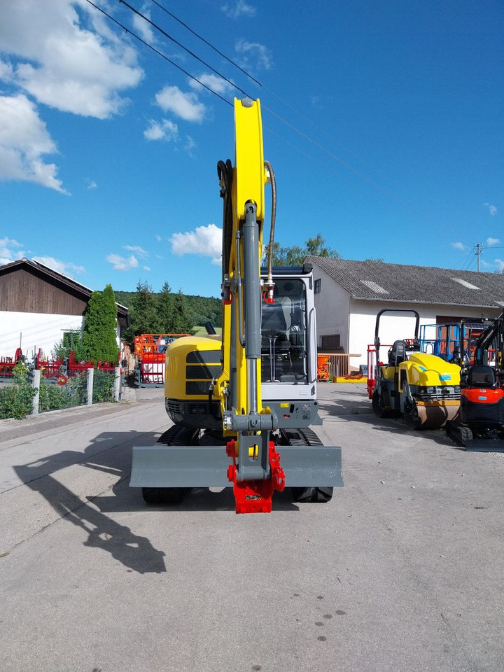 Neuson EZ 53 50 - Minikotró: 3 kép. Neuson EZ 53 50 - Minikotró: 3 kép.