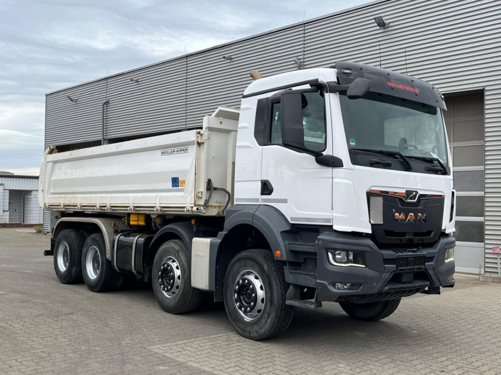 MAN MAN TG-S 4-Achs Kipper 37.470 8x4 Meiller Bordmatik - Billenőplatós teherautó: 2 kép. MAN MAN TG-S 4-Achs Kipper 37.470 8x4 Meiller Bordmatik - Billenőplatós teherautó: 2 kép.