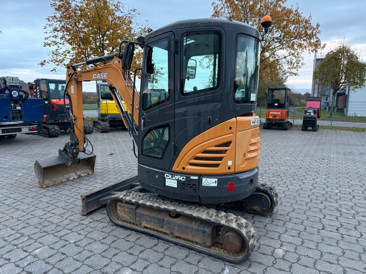 Case CX 26 C, Bj 19, 1975 BH, Tilt MS03, GL - Minikotró: 2 kép. Case CX 26 C, Bj 19, 1975 BH, Tilt MS03, GL - Minikotró: 2 kép.