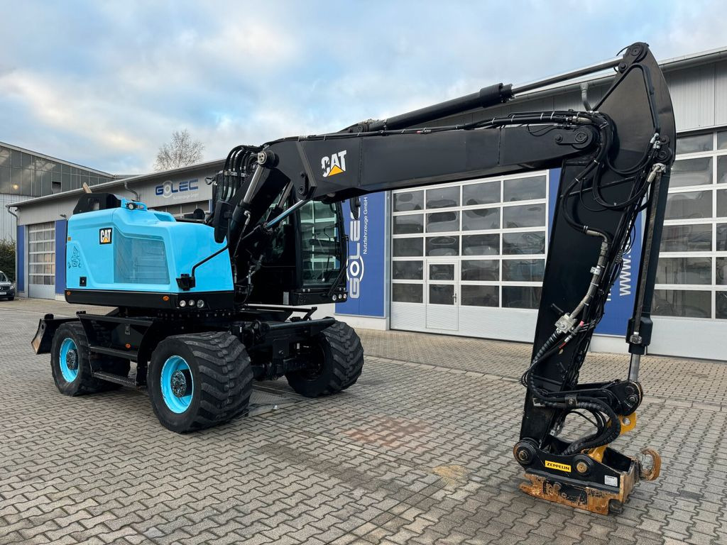 CAT M315F Mobilbagger *7.865 h *Schnellwechsel - Gumikerekes kotró: 1 kép. CAT M315F Mobilbagger *7.865 h *Schnellwechsel - Gumikerekes kotró: 1 kép.