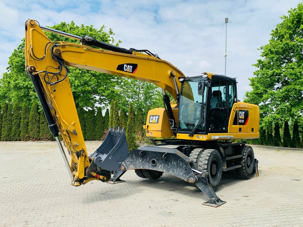 CAT M318F Mobilbagger *5.845 h *Schnellwechsel - Gumikerekes kotró: 1 kép. CAT M318F Mobilbagger *5.845 h *Schnellwechsel - Gumikerekes kotró: 1 kép.