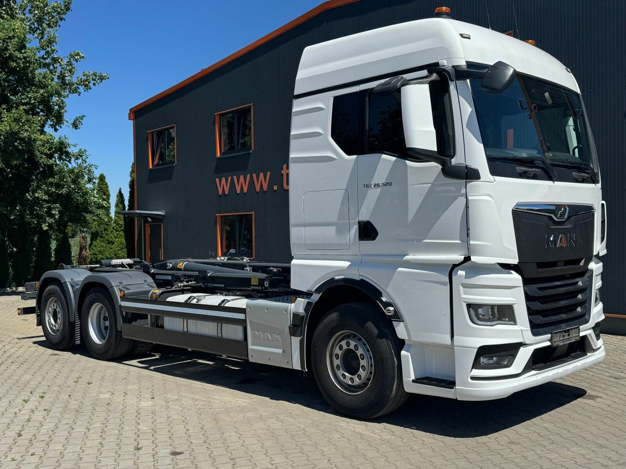 MAN TGX 26.520 6x2 Abrollkipper MEILLER RS 21.70 - Horgos rakodó teherautó: 1 kép. MAN TGX 26.520 6x2 Abrollkipper MEILLER RS 21.70 - Horgos rakodó teherautó: 1 kép.