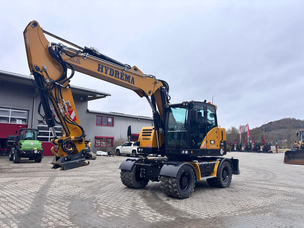 Hydrema MX18G Hydrema MX18G - Gumikerekes kotró: 1 kép. Hydrema MX18G Hydrema MX18G - Gumikerekes kotró: 1 kép.