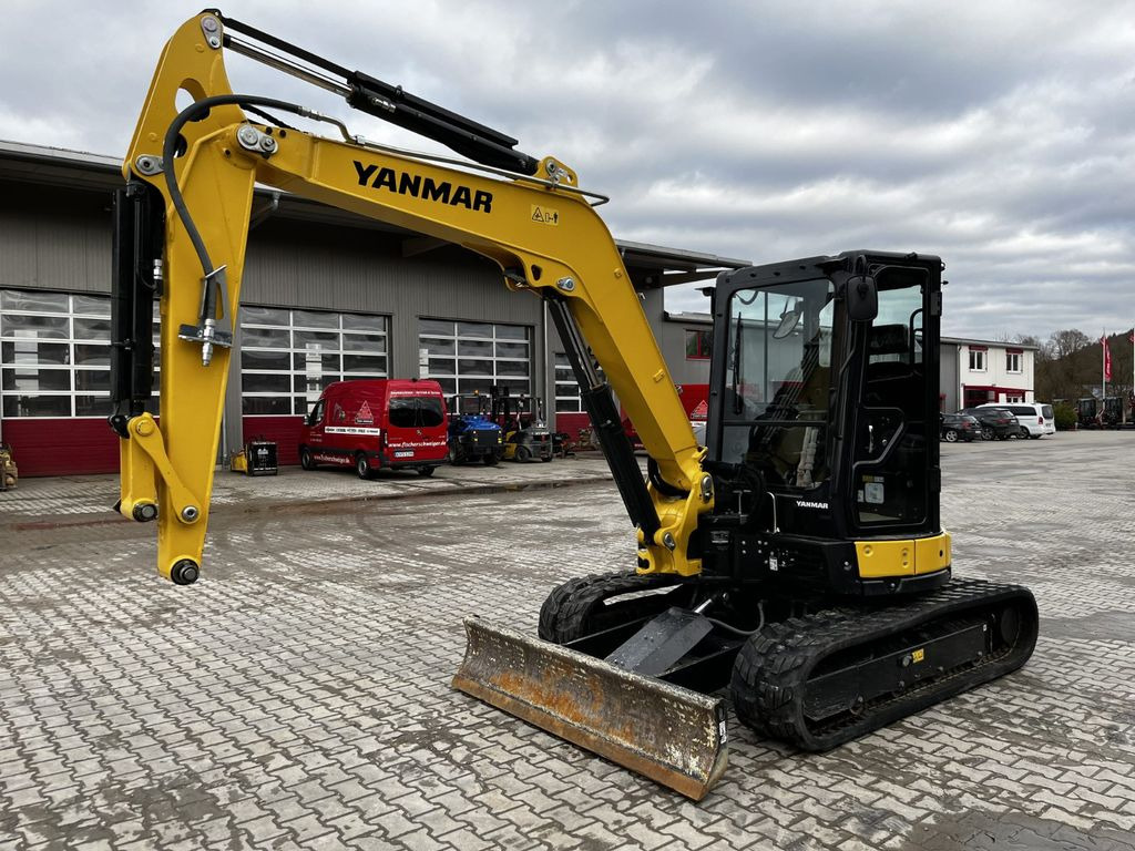 Yanmar VIO 57-6B - Minikotró: 1 kép. Yanmar VIO 57-6B - Minikotró: 1 kép.