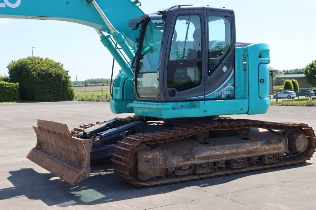 Kobelco SK 230 SR LC - Lánctalpas kotró: 2 kép. Kobelco SK 230 SR LC - Lánctalpas kotró: 2 kép.