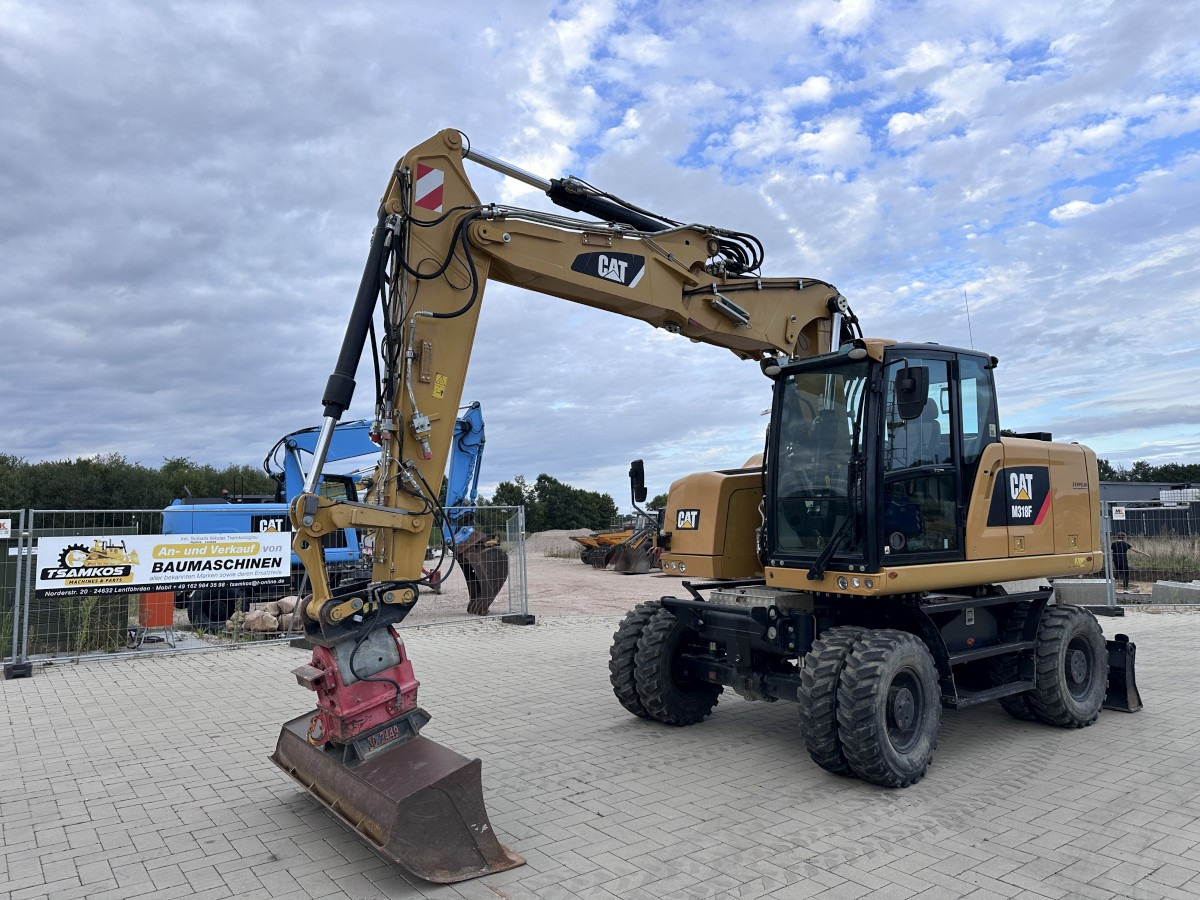 CATERPILLAR M 318 F Offset boom Deutsche Maschine Top ! - Gumikerekes kotró: 3 kép. CATERPILLAR M 318 F Offset boom Deutsche Maschine Top ! - Gumikerekes kotró: 3 kép.