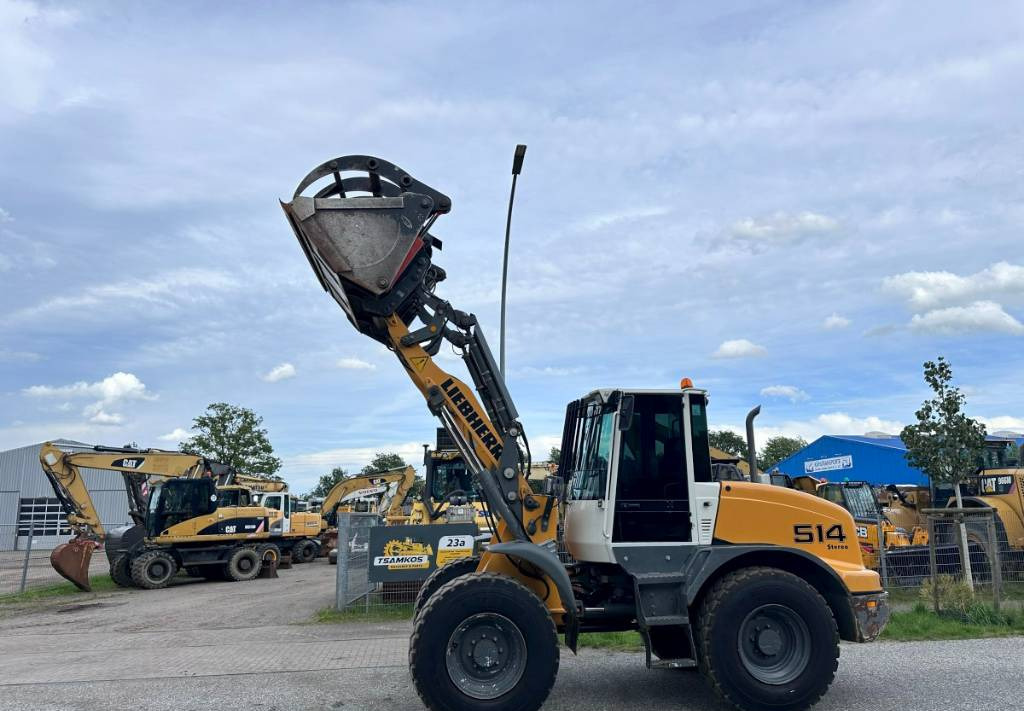 Gumikerekes homlokrakodó Liebherr L 514 Stereo +30 Kmh Klima 3er Kreis Greifschaufel: 43 kép.