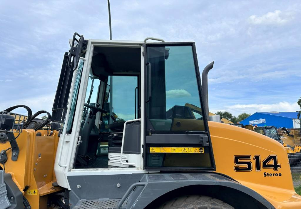 Gumikerekes homlokrakodó Liebherr L 514 Stereo +30 Kmh Klima 3er Kreis Greifschaufel: 8 kép.