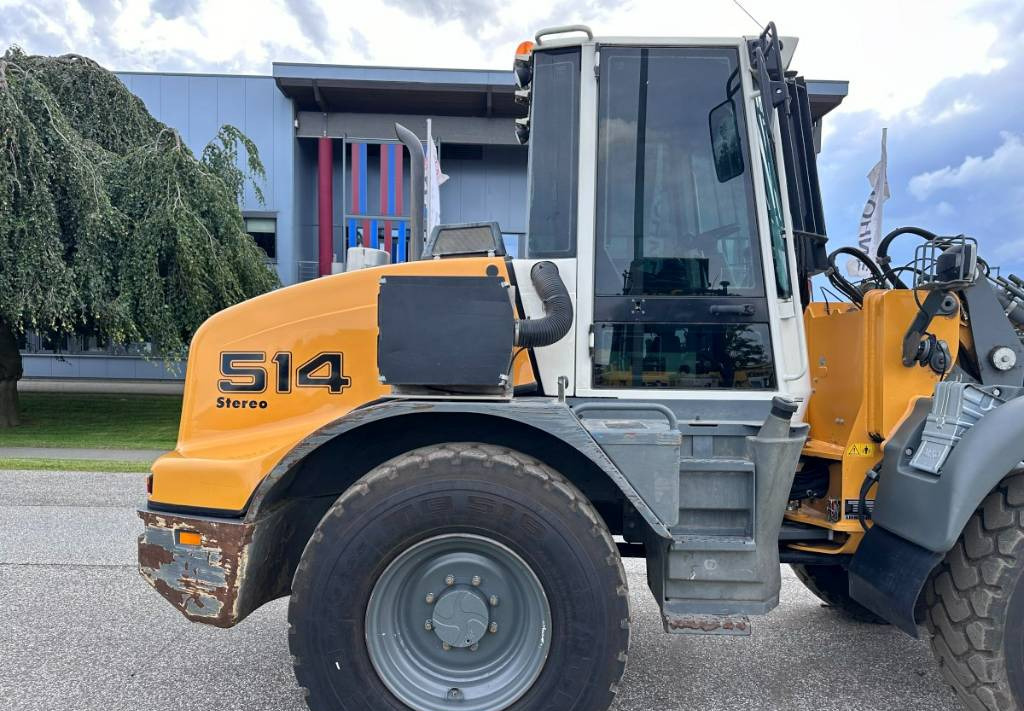 Gumikerekes homlokrakodó Liebherr L 514 Stereo +30 Kmh Klima 3er Kreis Greifschaufel: 23 kép.