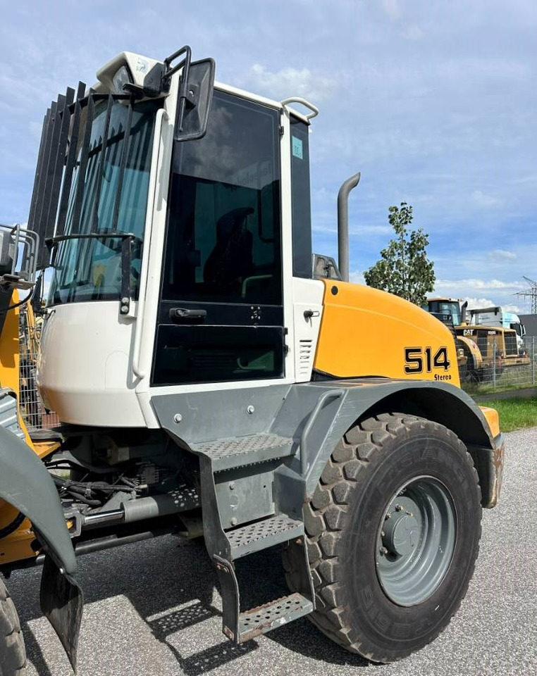 Gumikerekes homlokrakodó Liebherr L 514 Stereo +30 Kmh Klima 3er Kreis Greifschaufel: 7 kép.