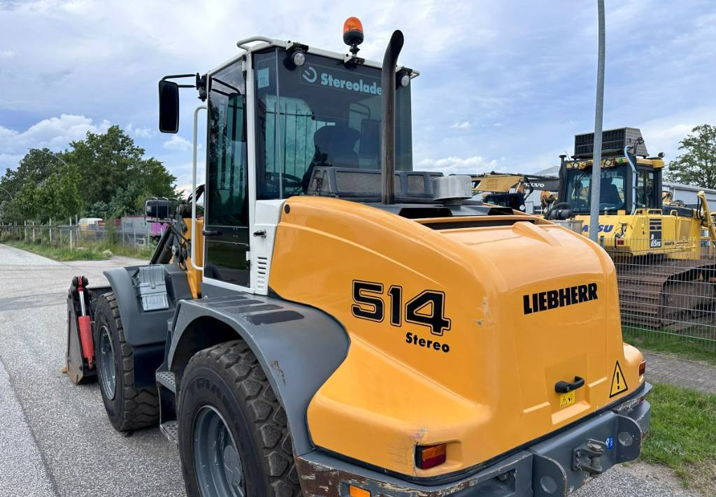 Gumikerekes homlokrakodó Liebherr L 514 Stereo +30 Kmh Klima 3er Kreis Greifschaufel: 21 kép.