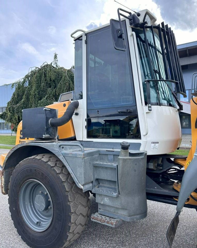 Gumikerekes homlokrakodó Liebherr L 514 Stereo +30 Kmh Klima 3er Kreis Greifschaufel: 24 kép.