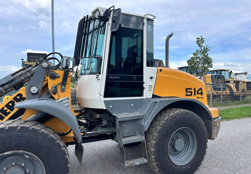 Gumikerekes homlokrakodó Liebherr L 514 Stereo +30 Kmh Klima 3er Kreis Greifschaufel: 20 kép.