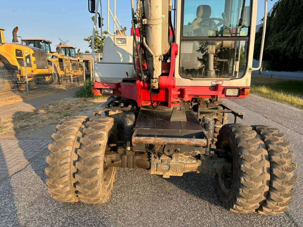 Gumikerekes kotró Takeuchi TB 175 W 8,7 ton. Klima Turbo 77 PS: 21 kép.