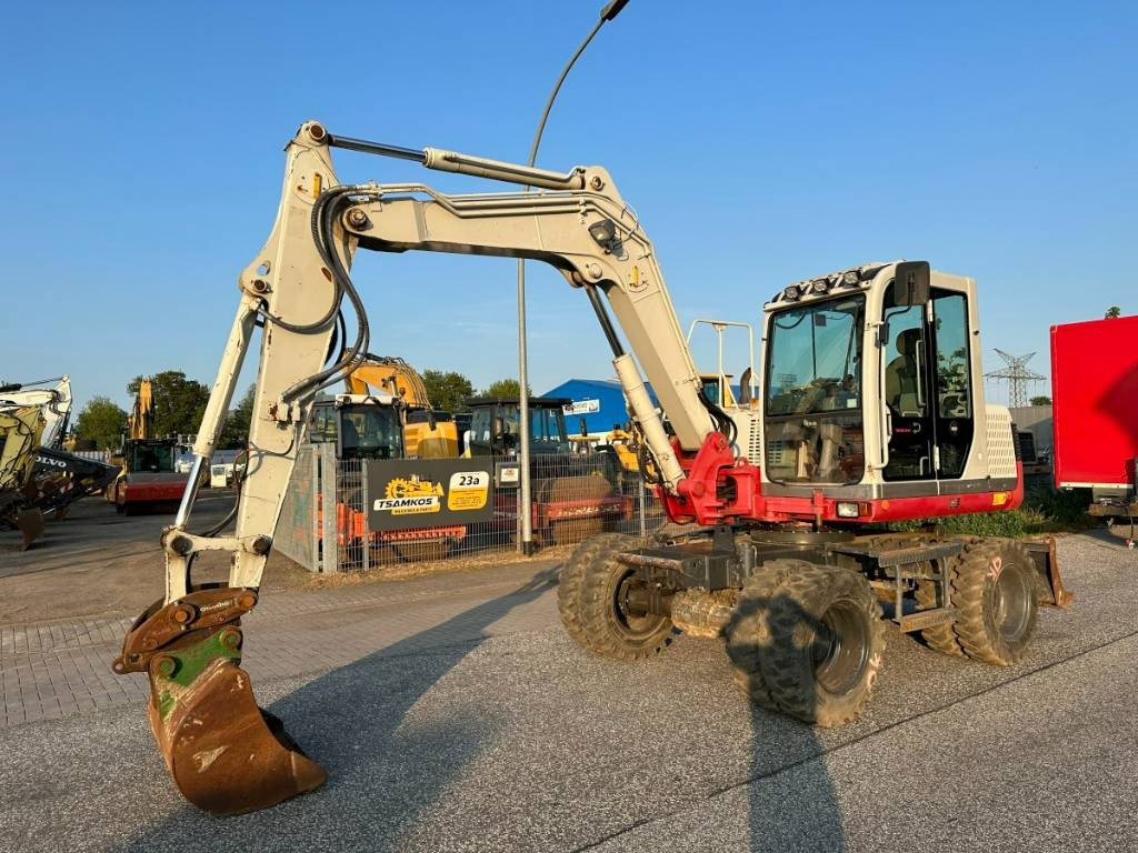 Takeuchi TB 175 W 8,7 ton. Klima Turbo 77 PS - Gumikerekes kotró: 3 kép. Takeuchi TB 175 W 8,7 ton. Klima Turbo 77 PS - Gumikerekes kotró: 3 kép.