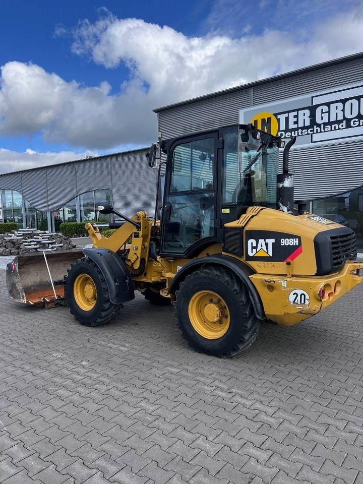 CAT 908 H - Gumikerekes homlokrakodó: 4 kép. CAT 908 H - Gumikerekes homlokrakodó: 4 kép.