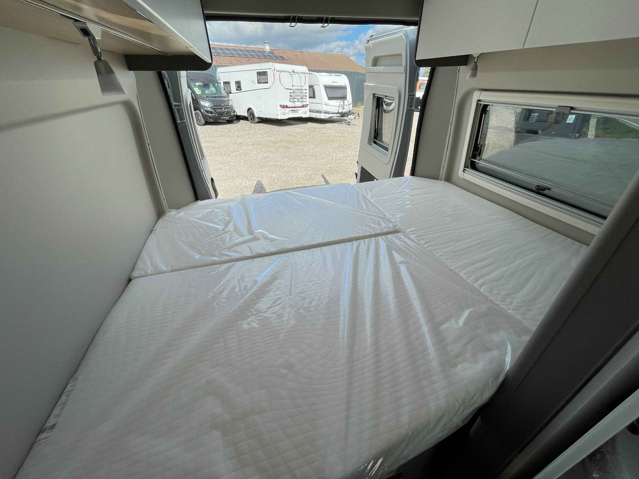 Kempingautó LMC INNOVAN 600 ,ASD, Aufstelldach,26 Modell,Navi: 13 kép.