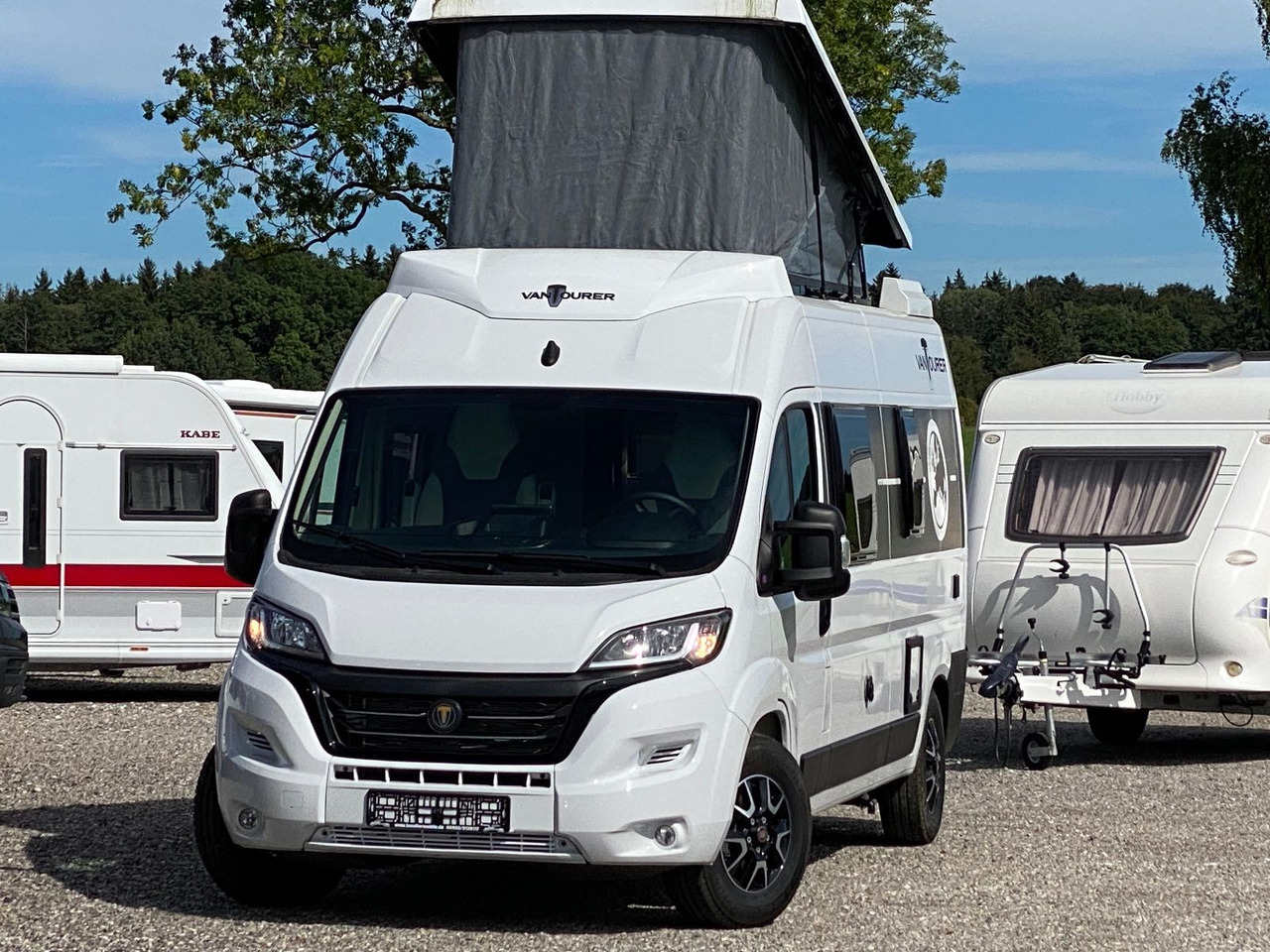 VANTourer 600 D 180PS, mit Aufstelldach,Navi,Markise - Kempingautó: 3 kép. VANTourer 600 D 180PS, mit Aufstelldach,Navi,Markise - Kempingautó: 3 kép.