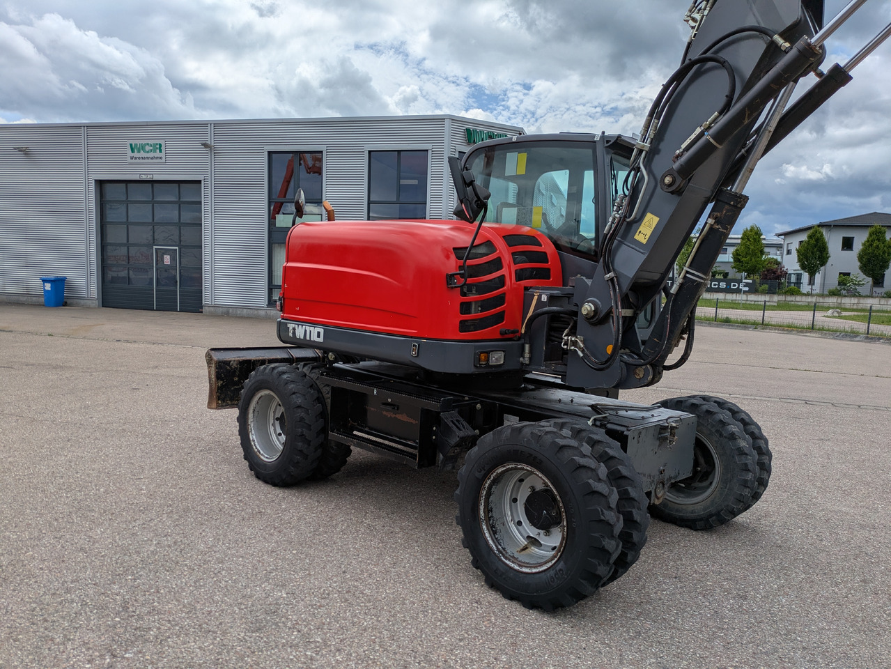 TEREX TW110 Mobilbagger Powertilt Rußpartikelfilter - Gumikerekes kotró: 5 kép. TEREX TW110 Mobilbagger Powertilt Rußpartikelfilter - Gumikerekes kotró: 5 kép.