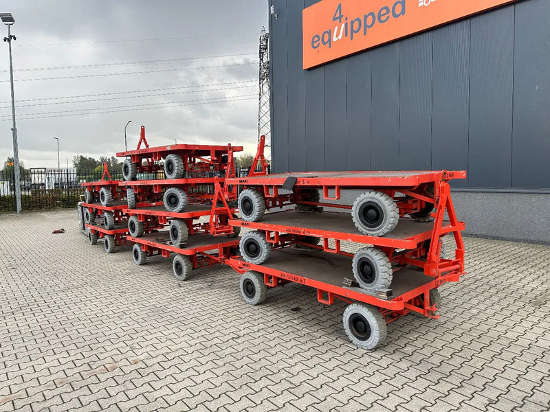 Still + 9x 2016 MAFI double-steered and connectable heavy-duty trailers with 6000kg loading capacity - Platós pótkocsi: 3 kép. Still + 9x 2016 MAFI double-steered and connectable heavy-duty trailers with 6000kg loading capacity - Platós pótkocsi: 3 kép.
