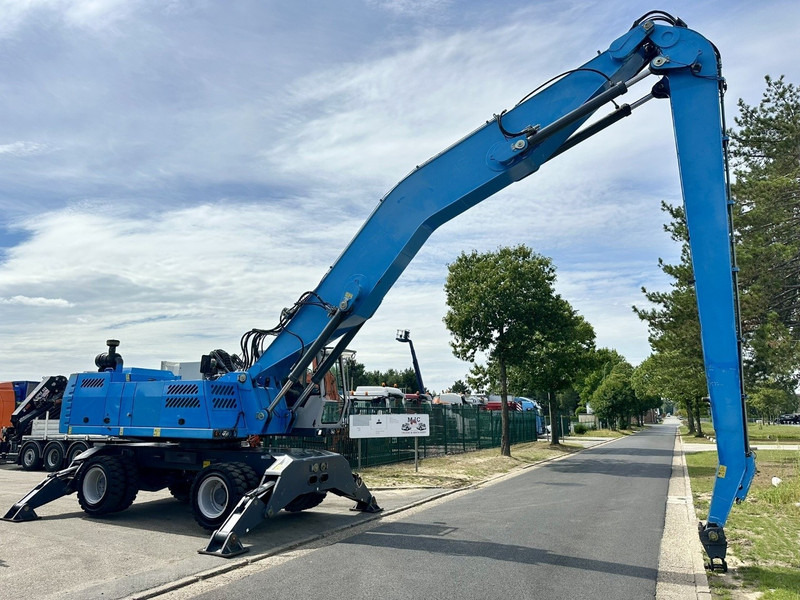 Fuchs TEREX MHL 360 OVERSLAGKRAAN / MATERIAL HANDLER / UMSCHLAGBAGGER - TOP ZUSTAND - Gumikerekes kotró: 2 kép. Fuchs TEREX MHL 360 OVERSLAGKRAAN / MATERIAL HANDLER / UMSCHLAGBAGGER - TOP ZUSTAND - Gumikerekes kotró: 2 kép.