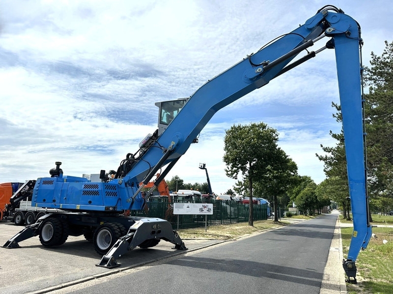 Fuchs TEREX MHL 360 OVERSLAGKRAAN / MATERIAL HANDLER / UMSCHLAGBAGGER - TOP ZUSTAND - Gumikerekes kotró: 1 kép. Fuchs TEREX MHL 360 OVERSLAGKRAAN / MATERIAL HANDLER / UMSCHLAGBAGGER - TOP ZUSTAND - Gumikerekes kotró: 1 kép.