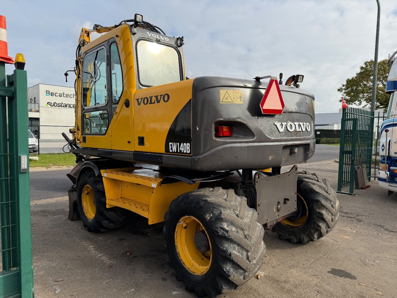 Volvo EW 140 B *FULL HYDR* - BLADE - 10.485h - TILT BUCKET - CE - NL MACHINE - GOOD CONDITION - Gumikerekes kotró: 4 kép. Volvo EW 140 B *FULL HYDR* - BLADE - 10.485h - TILT BUCKET - CE - NL MACHINE - GOOD CONDITION - Gumikerekes kotró: 4 kép.